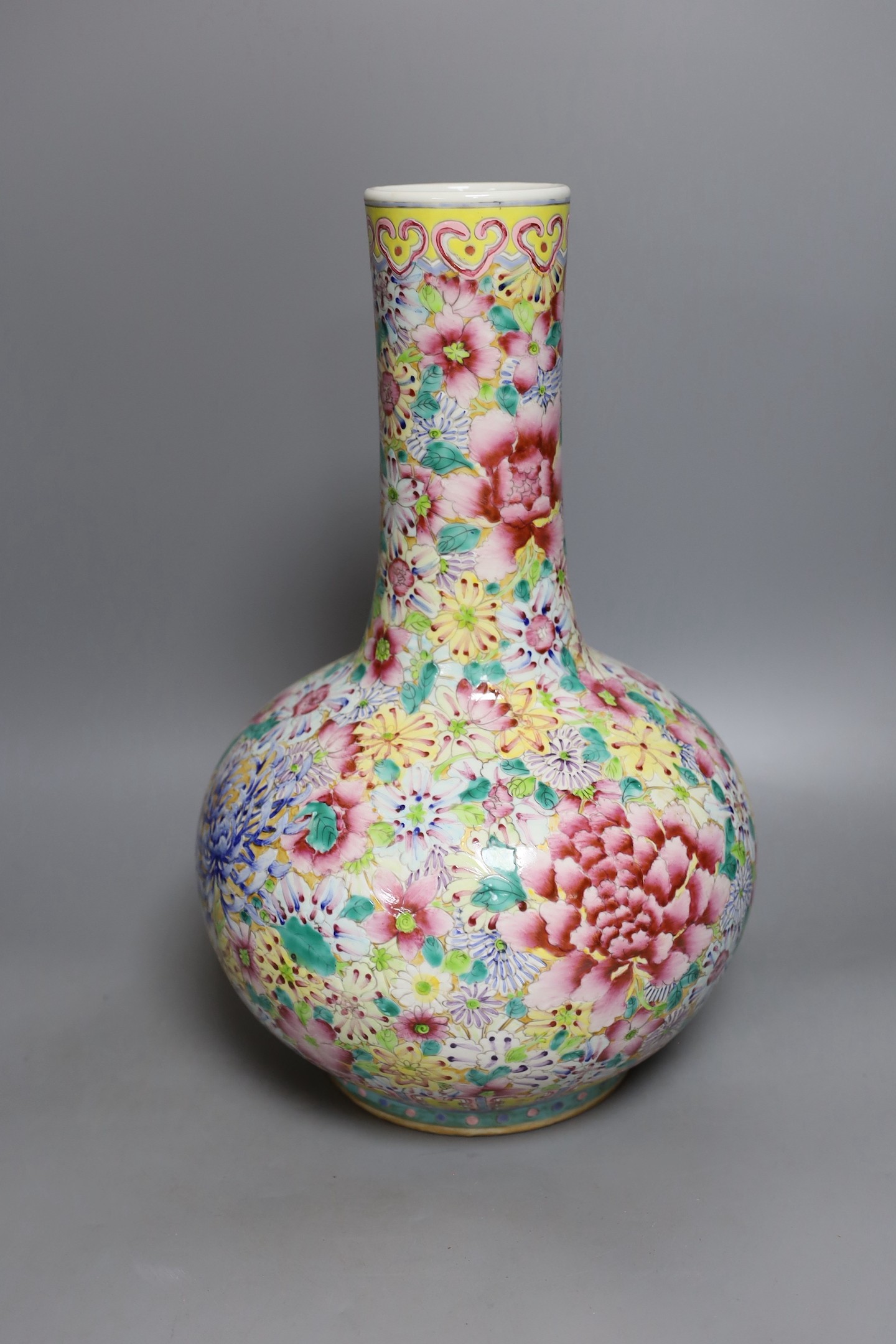 A Chinese famille rose millefleur vase, 40cms high.